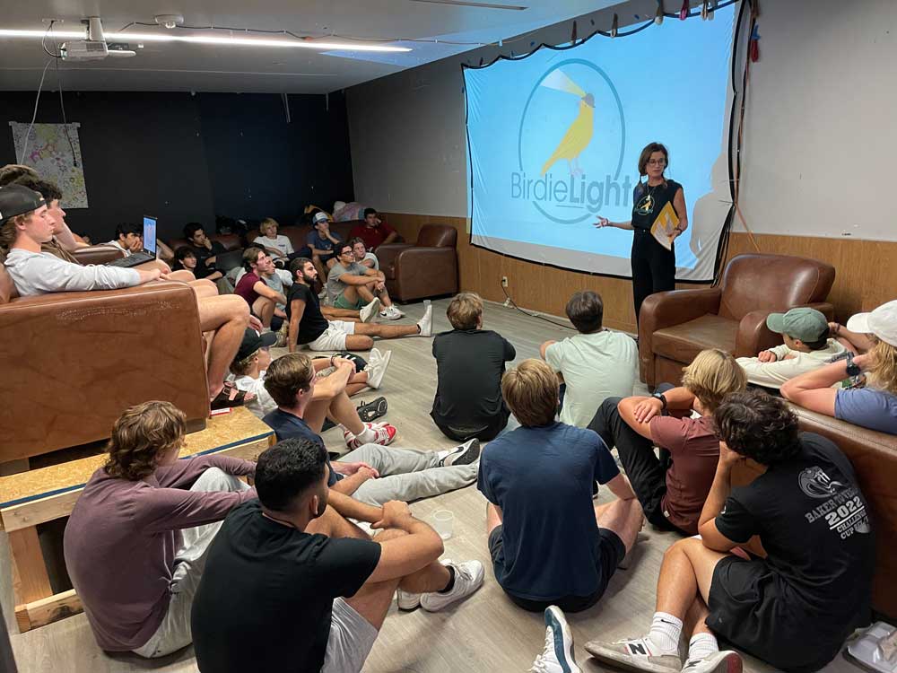 BirdieLight How To, photo of BirdLight Founder Beth speaking to students in a classroom
